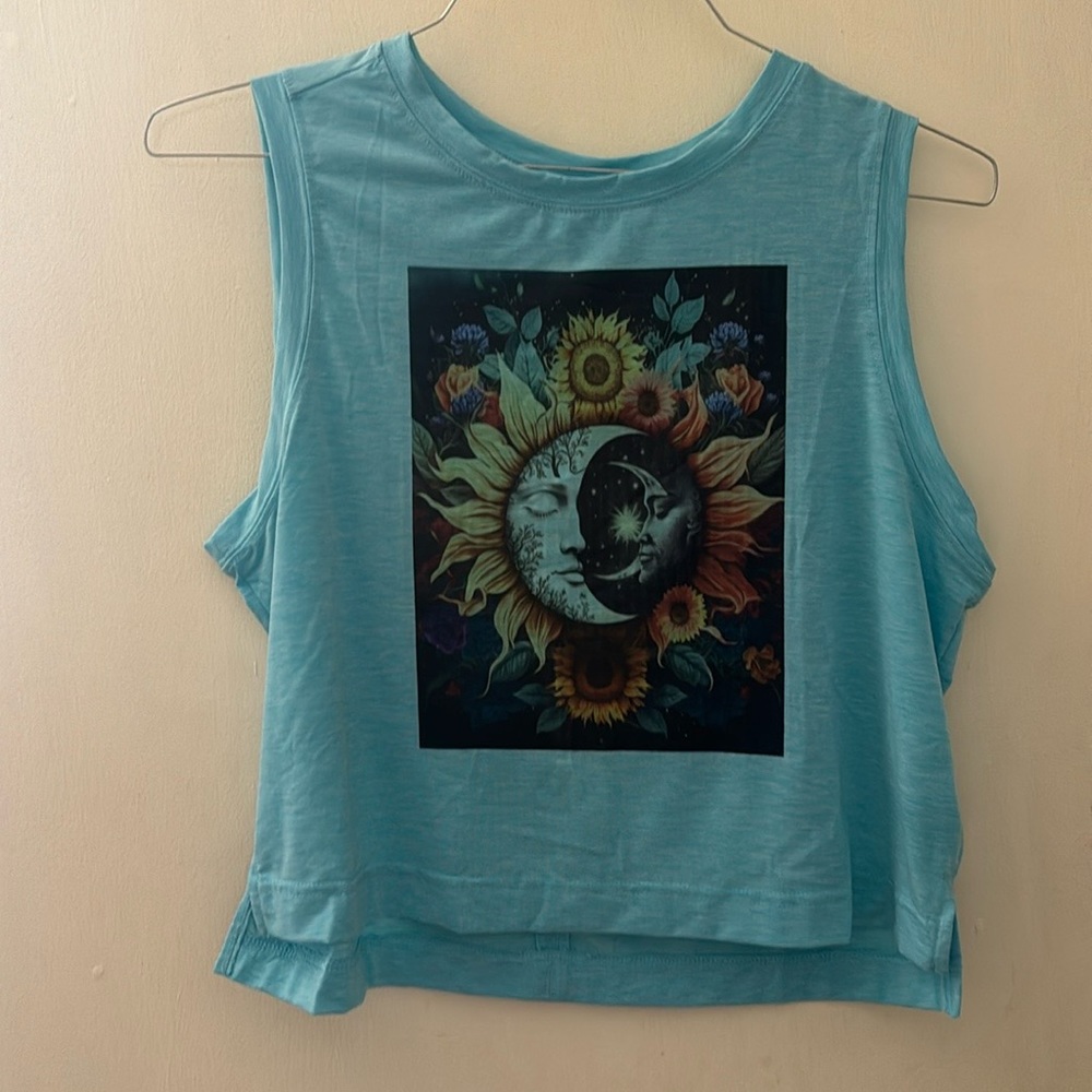 New. Sublimated. handcrafted, designed and sublimated moon and sun t shirt.